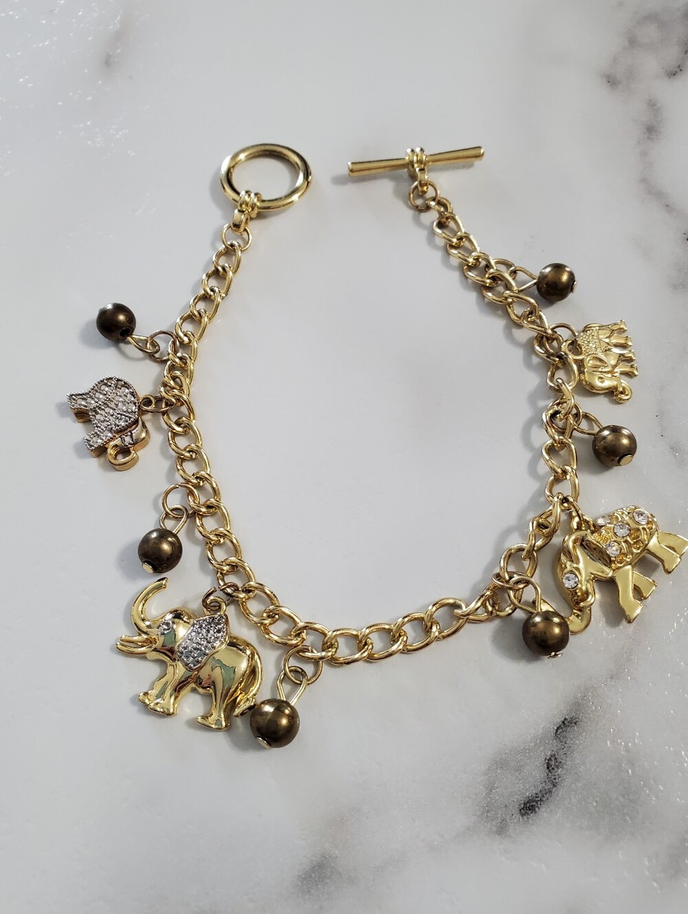 Gold Elephant Charm Toggle Bracelet with Rhinestone Accents
